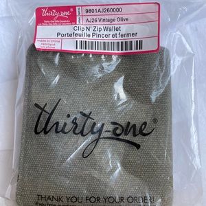 (9801) $28 NIP CLIP N’ ZIP WALLET in Vintage Olive Pattern